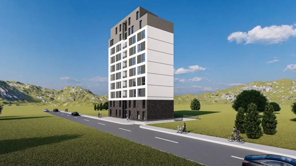 Tall white apartment building beside a road and grassy hills