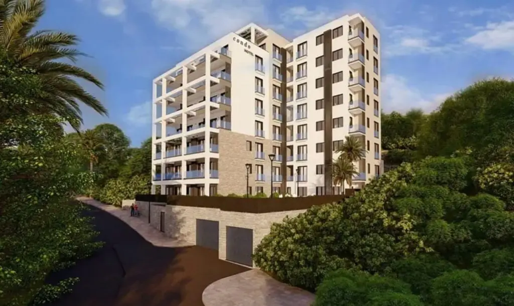 Rendering of a condo hotel apartment building with greenery