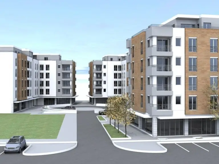 3D rendering of modern apartment buildings with a central driveway