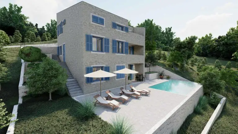 Stone house with blue shutters, pool, and loungers