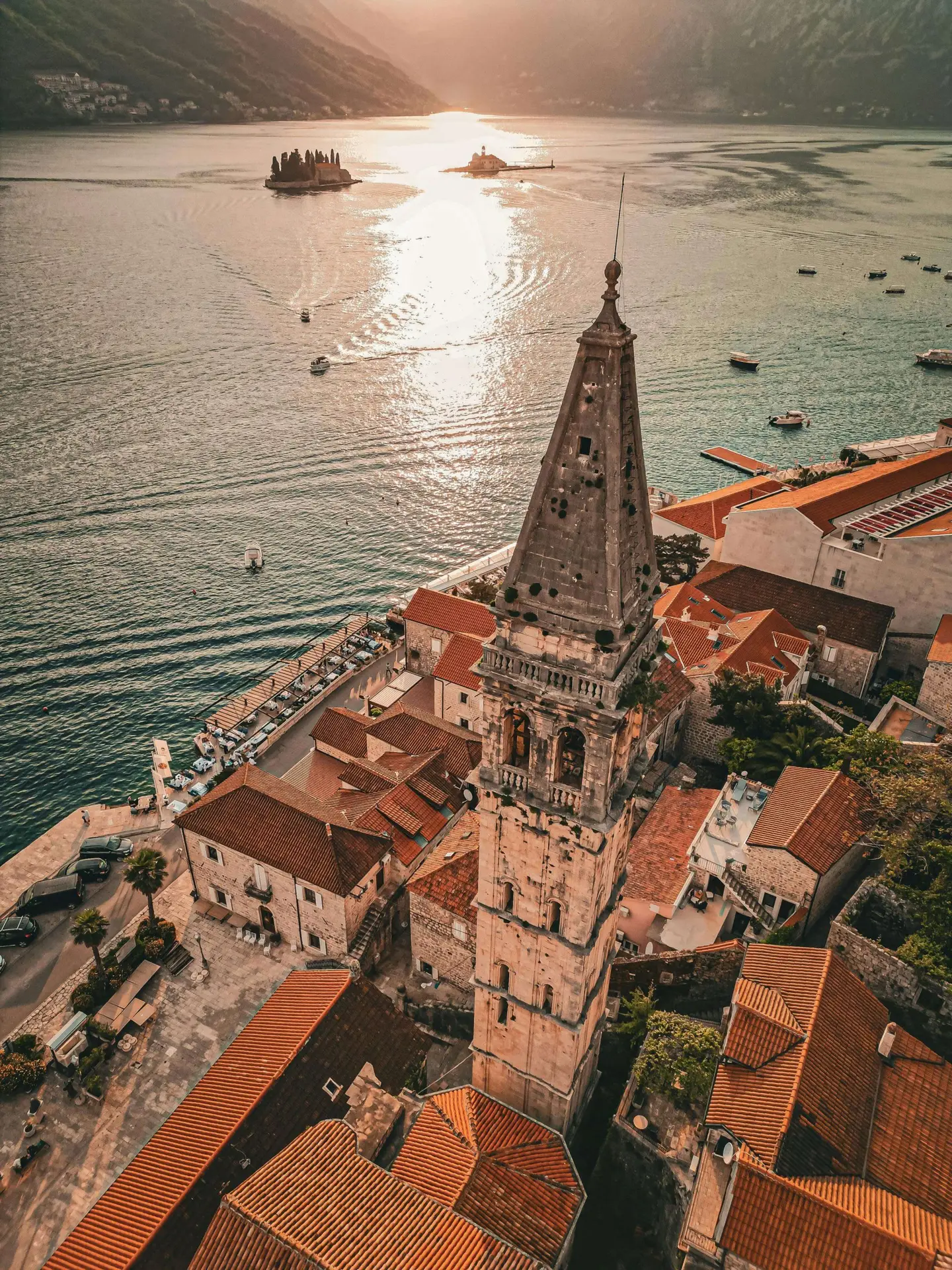 Aerial view of a church tower above a bay
