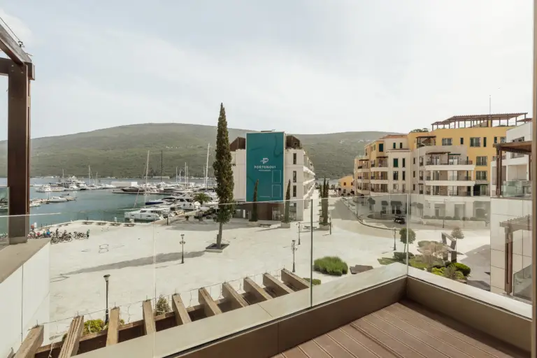 Balcony view over Portonovi marina plaza and yachts