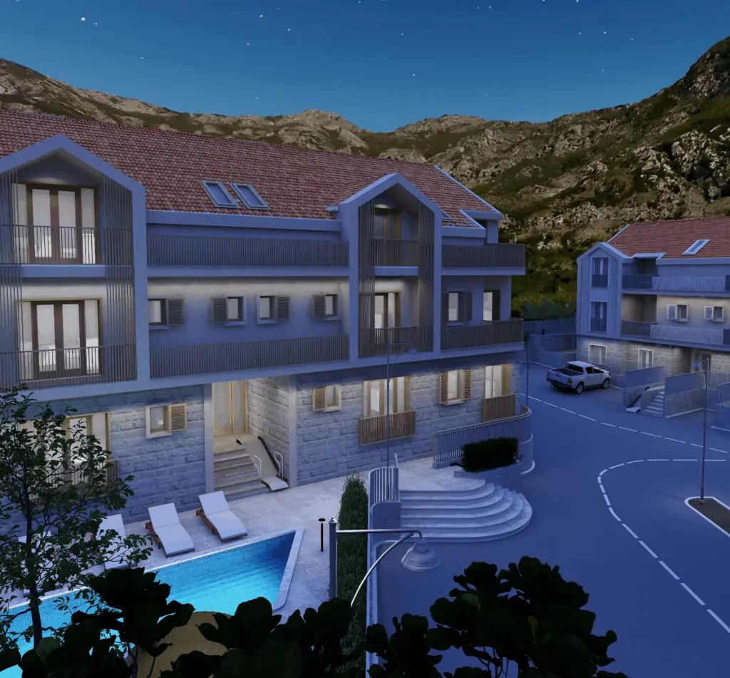 Dusk rendering of apartment buildings with pool and mountains
