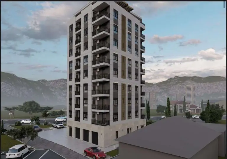 Rendered apartment building with balconies and parked cars