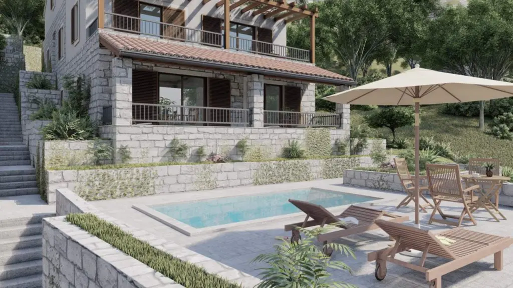 Stone house with terrace, pool, and umbrella patio