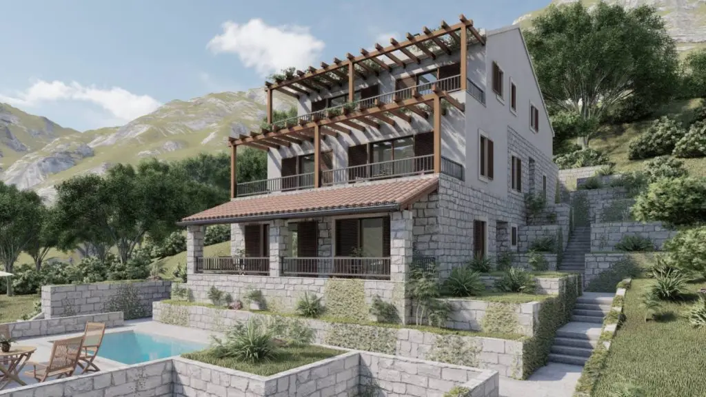 Stone house with terraces and a small pool on a hillside