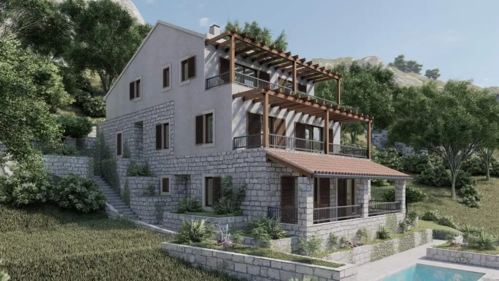 Stone hillside house with balconies and a pool