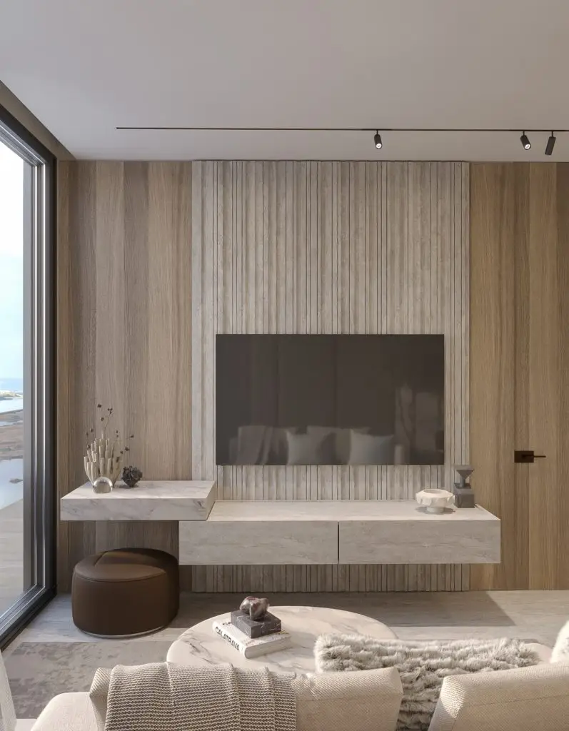 Modern living room with wall-mounted TV and marble console