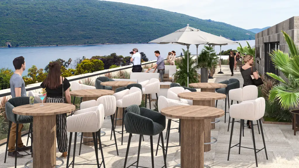 Seaside terrace with tables, chairs, people, and umbrellas