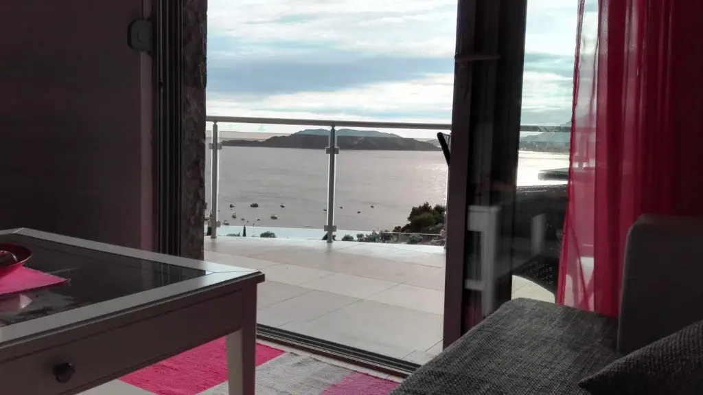 Interior room with sliding door to sea-view balcony