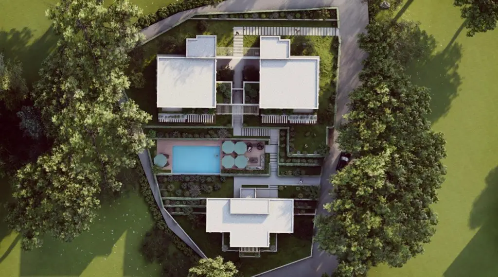 Aerial rendering of three modern buildings with a central pool and trees