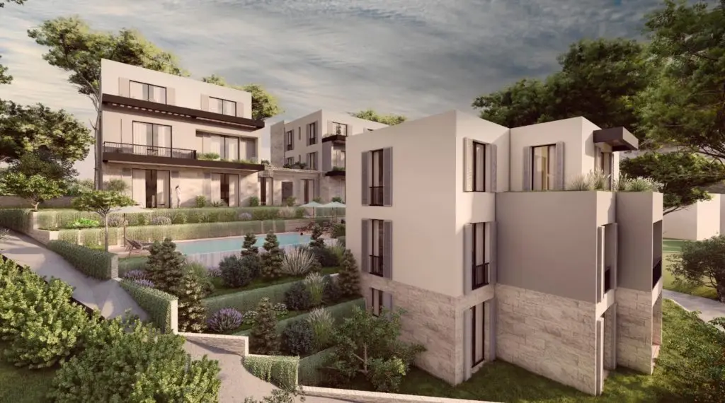 Modern apartment buildings with landscaped gardens and swimming pool