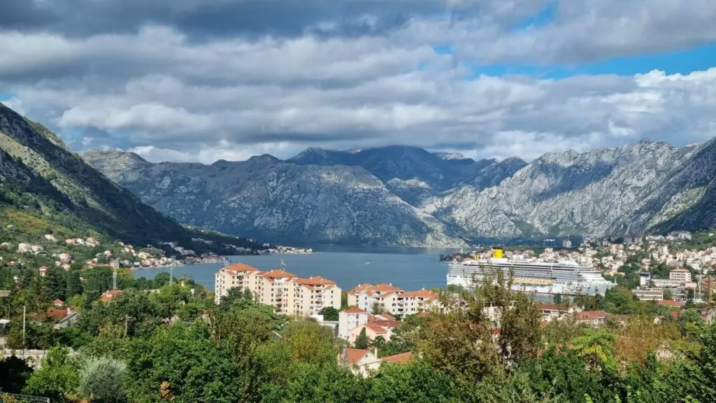 Kotor Bay with mountains, buildings, and cruise ship