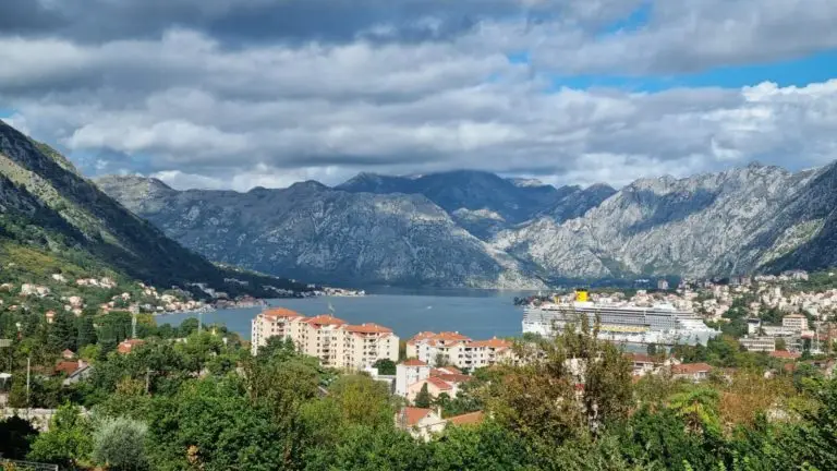 Kotor Bay with mountains, buildings, and cruise ship