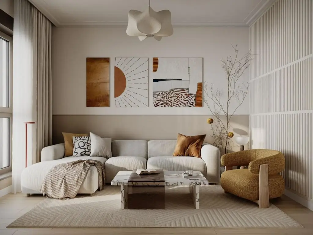 Modern living room with sofa, abstract wall art, and armchair
