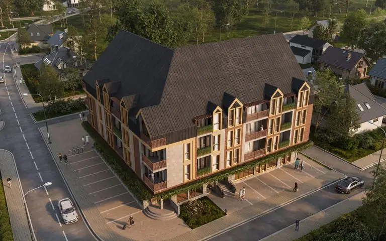 Aerial view of modern apartment building with steep roof
