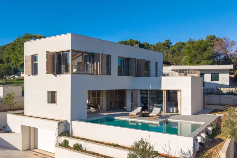 Modern white villa with terrace and swimming pool